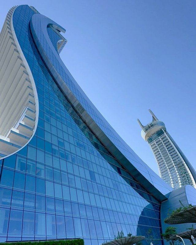 Modern glass façade in Doha, Qatar — drone-accessible curtain-wall cleaning by Clear Sky Drones